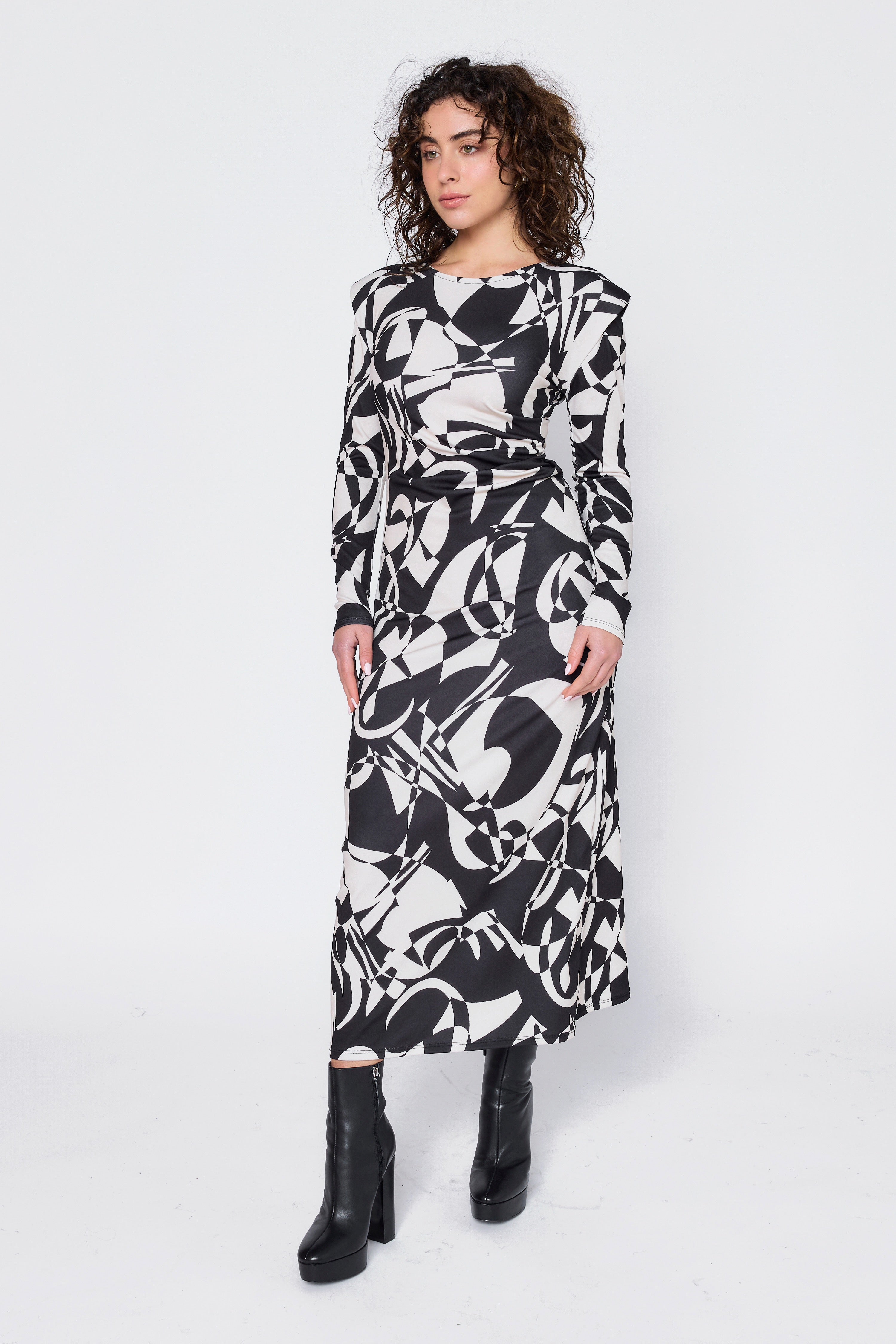 Long flowing printed dress with shoulder pads